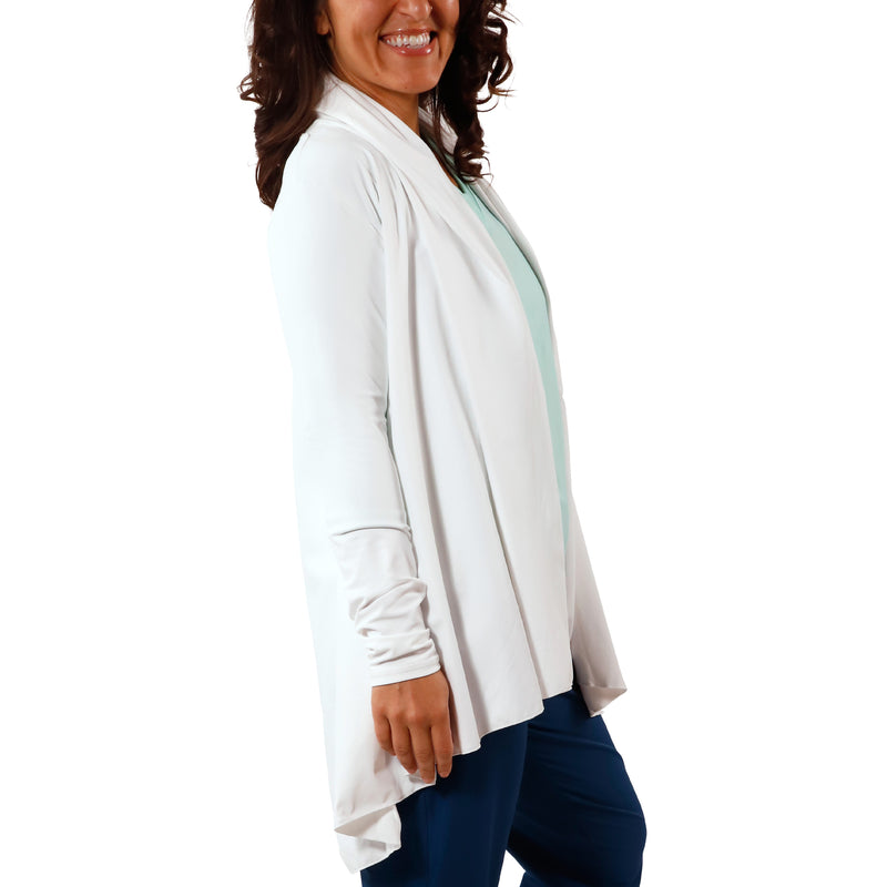 Side view of women's hooded beach cover up in white|white